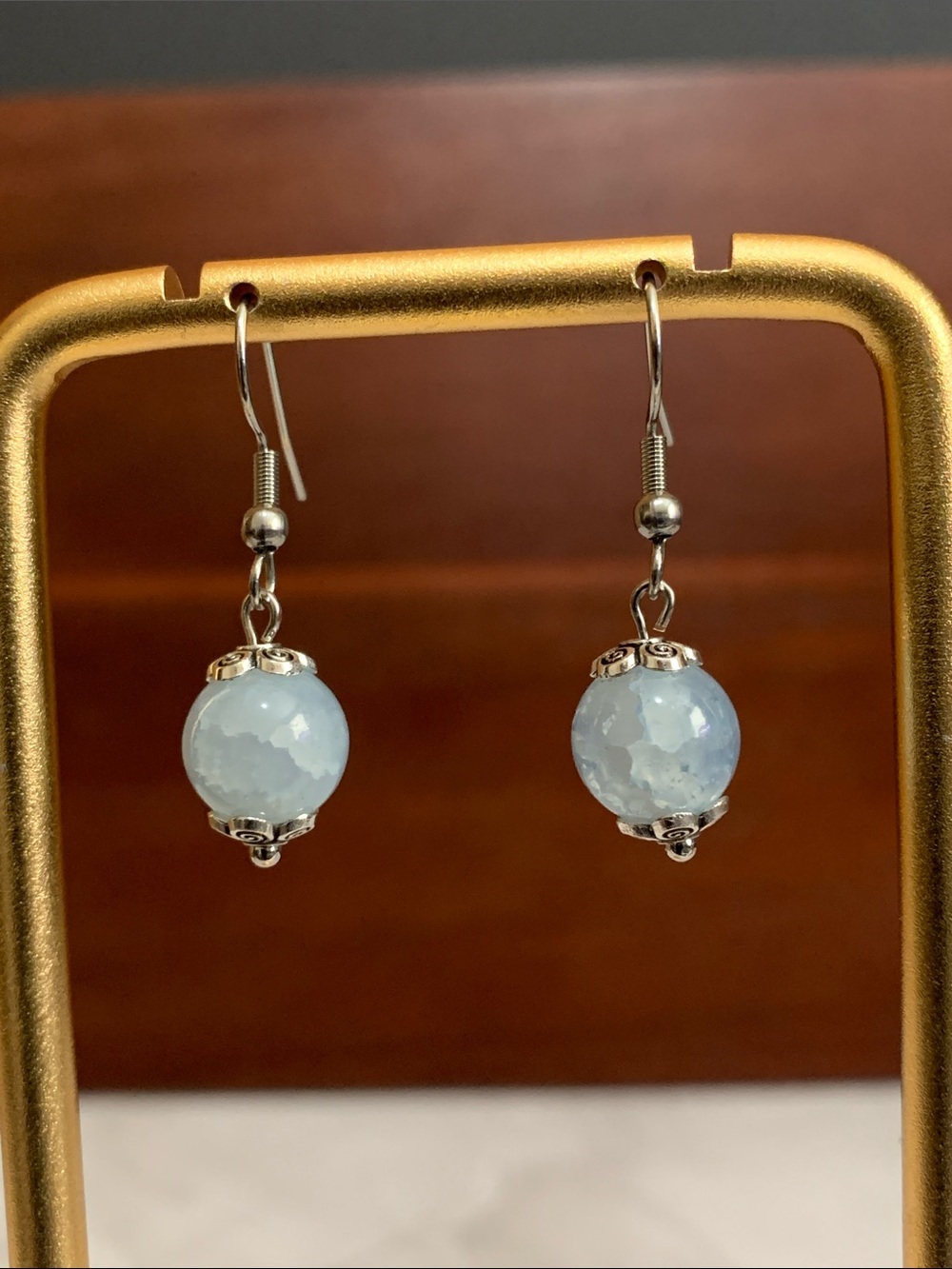 Handmade silver tone light blue crackle bead earrings